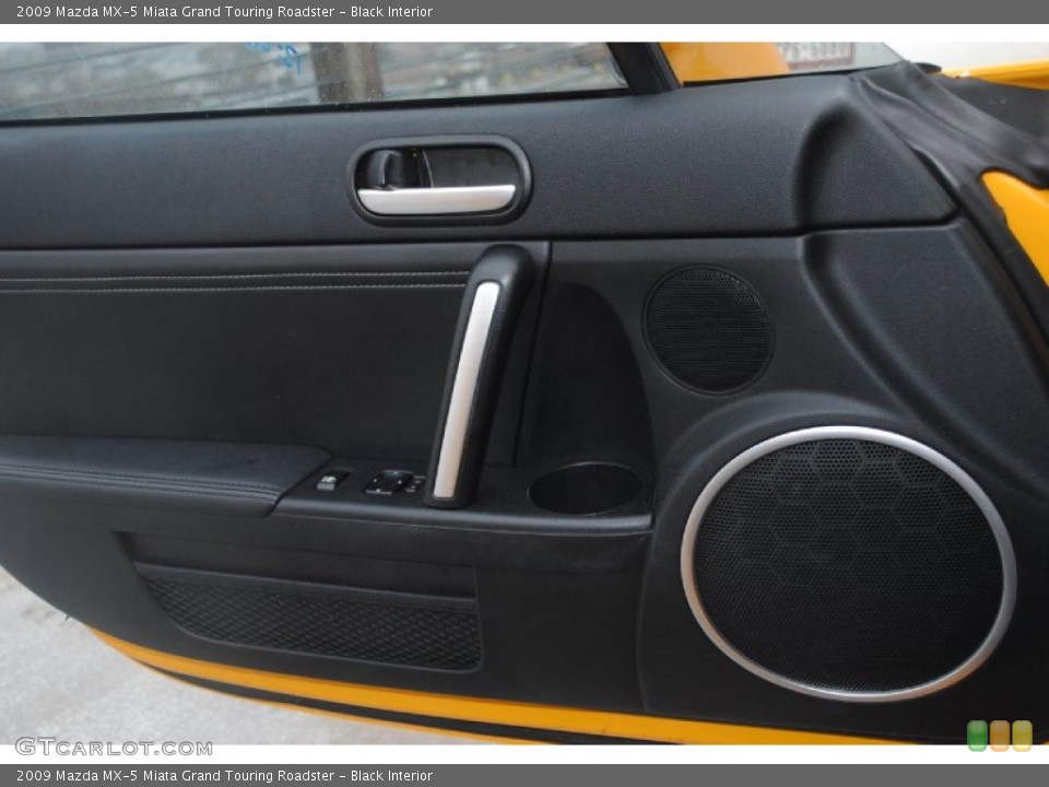 Black Interior Door Panel for the 2009 Mazda MX-5 Miata Grand Touring Roadster #75327897