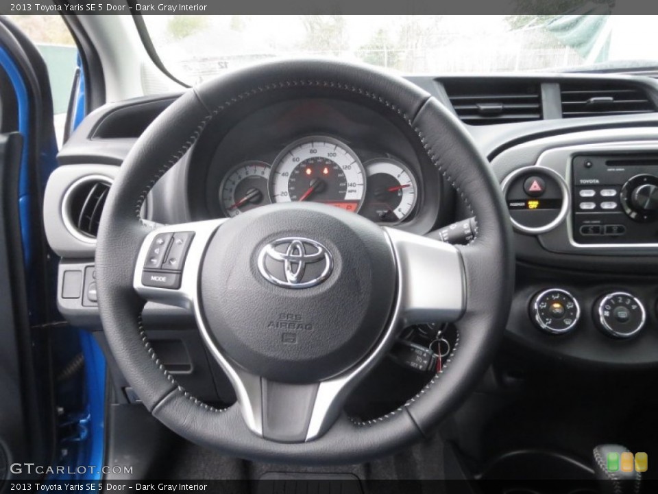 Dark Gray Interior Steering Wheel for the 2013 Toyota Yaris SE 5 Door #75329957