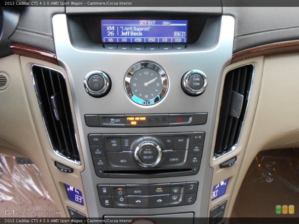 Cashmere/Cocoa Interior Controls for the 2013 Cadillac CTS 4 3.0 AWD Sport Wagon #75330627