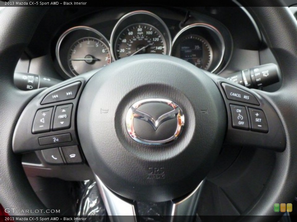 Black Interior Steering Wheel for the 2013 Mazda CX-5 Sport AWD #75346720