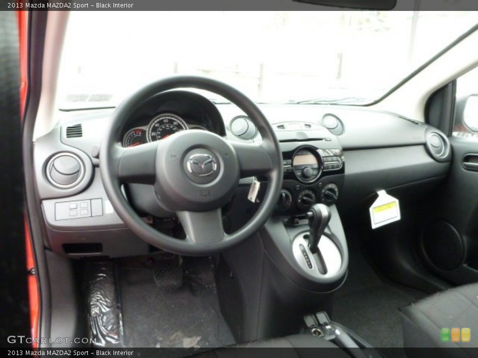 Black Interior Dashboard for the 2013 Mazda MAZDA2 Sport #75346954