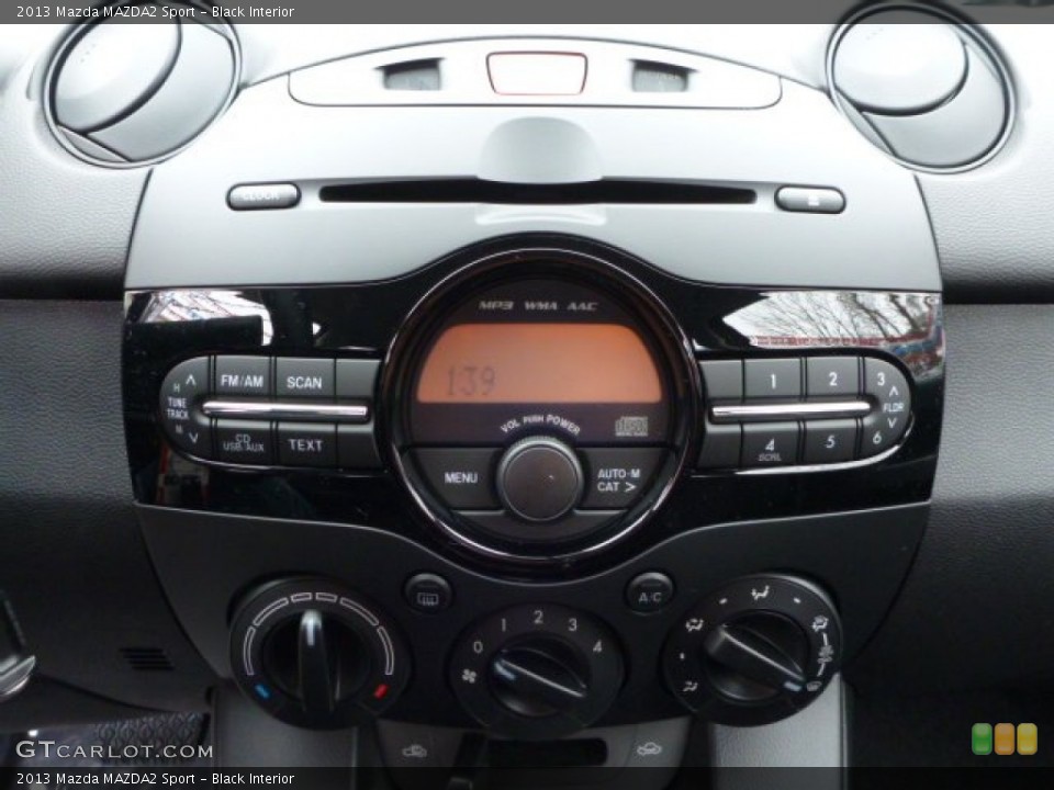 Black Interior Controls for the 2013 Mazda MAZDA2 Sport #75347023