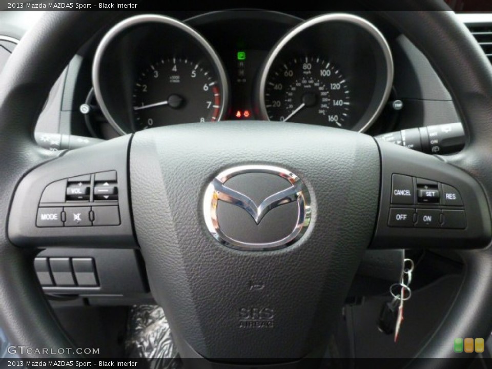 Black Interior Steering Wheel for the 2013 Mazda MAZDA5 Sport #75347263