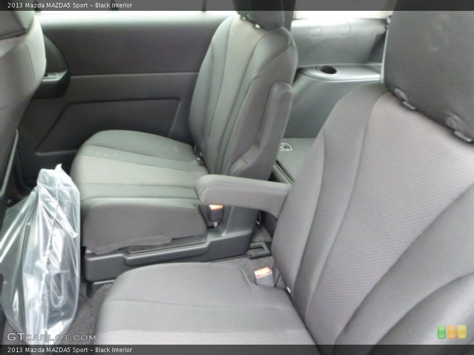 Black Interior Rear Seat for the 2013 Mazda MAZDA5 Sport #75347403