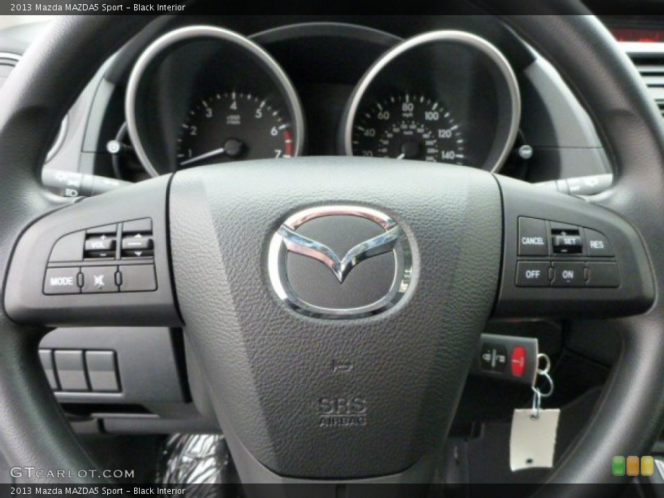 Black Interior Steering Wheel for the 2013 Mazda MAZDA5 Sport #75347470