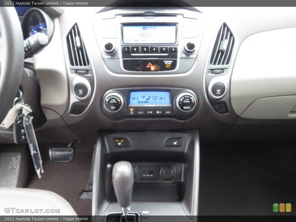 Taupe Interior Controls for the 2011 Hyundai Tucson Limited #75371908