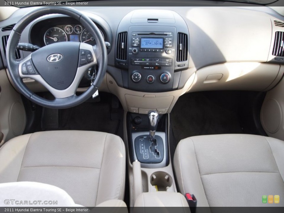 Beige Interior Dashboard for the 2011 Hyundai Elantra Touring SE #75397932