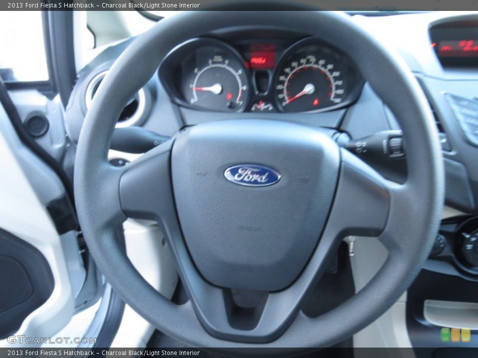 Charcoal Black/Light Stone Interior Steering Wheel for the 2013 Ford Fiesta S Hatchback #75444262