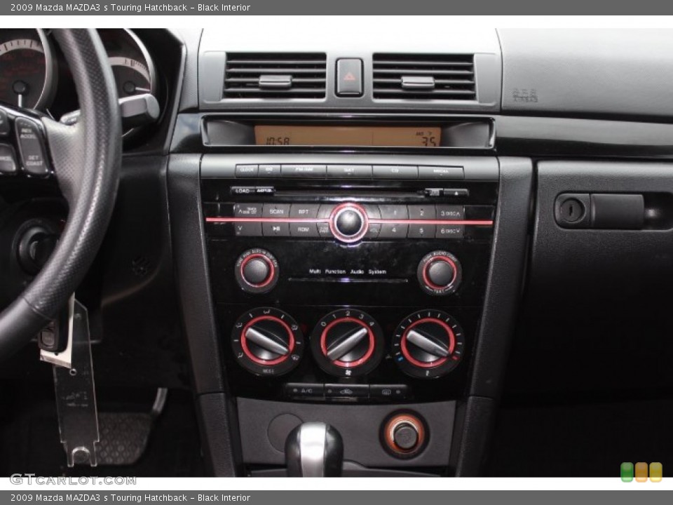 Black Interior Controls for the 2009 Mazda MAZDA3 s Touring Hatchback #75545688