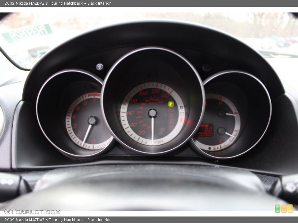 Black Interior Gauges for the 2009 Mazda MAZDA3 s Touring Hatchback #75545721