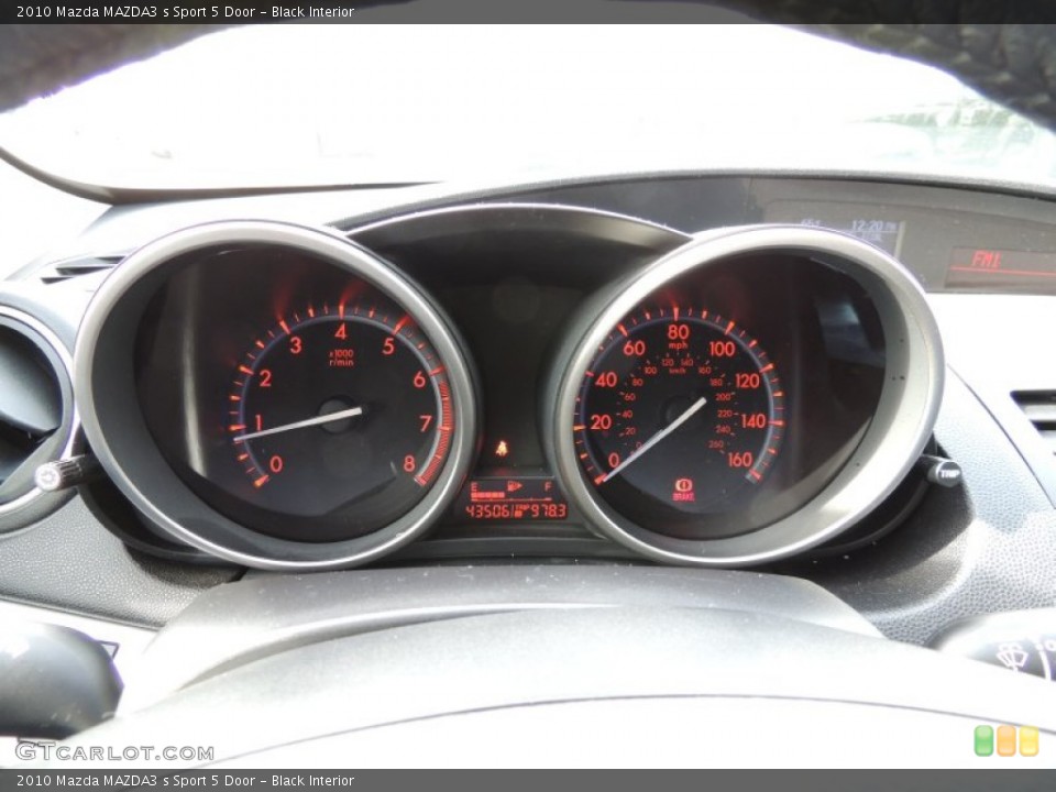 Black Interior Gauges for the 2010 Mazda MAZDA3 s Sport 5 Door #75615227