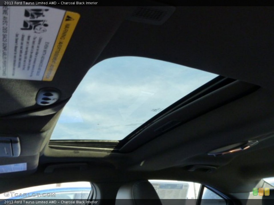 Charcoal Black Interior Sunroof for the 2013 Ford Taurus Limited AWD #75635709