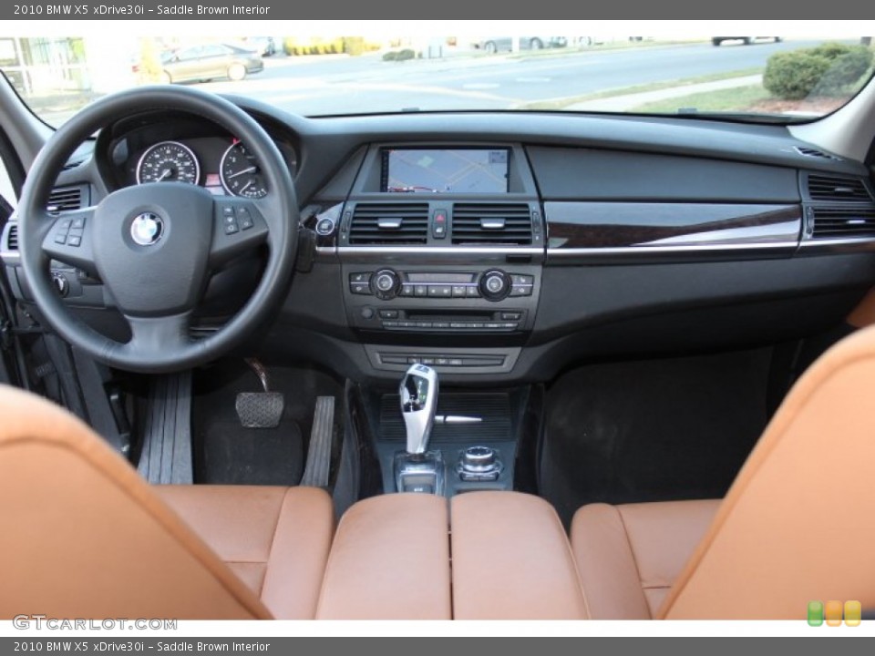 Saddle Brown Interior Dashboard for the 2010 BMW X5 xDrive30i #75639423