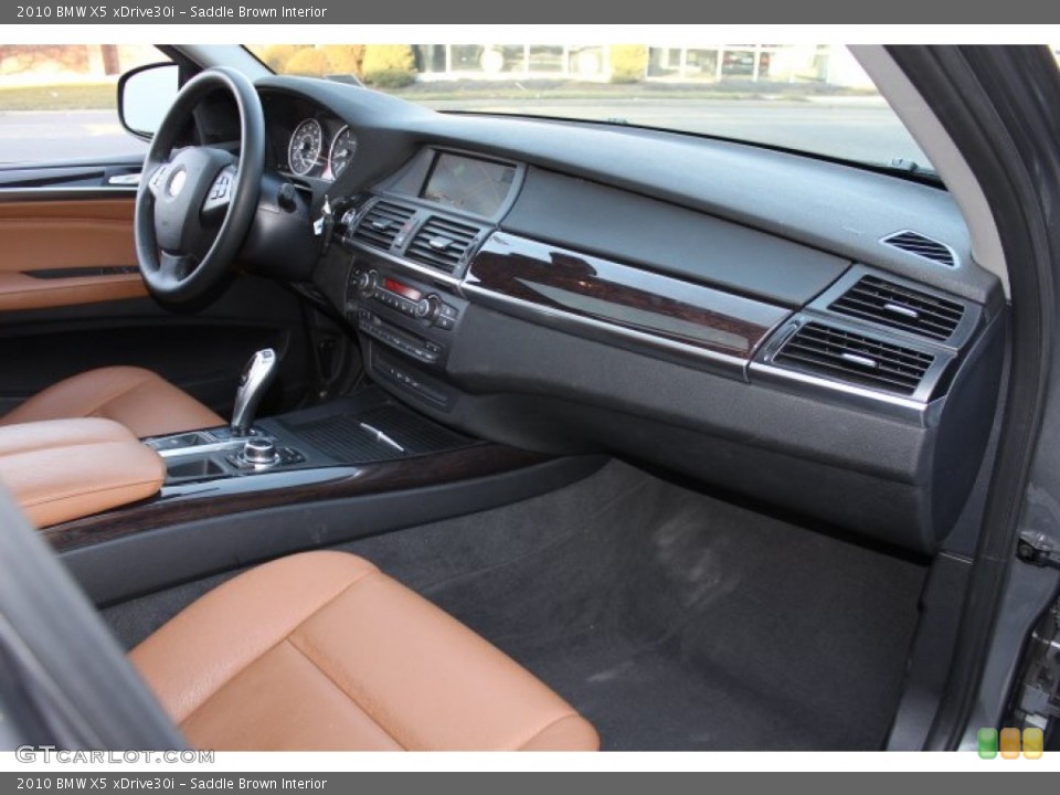 Saddle Brown Interior Dashboard for the 2010 BMW X5 xDrive30i #75639711