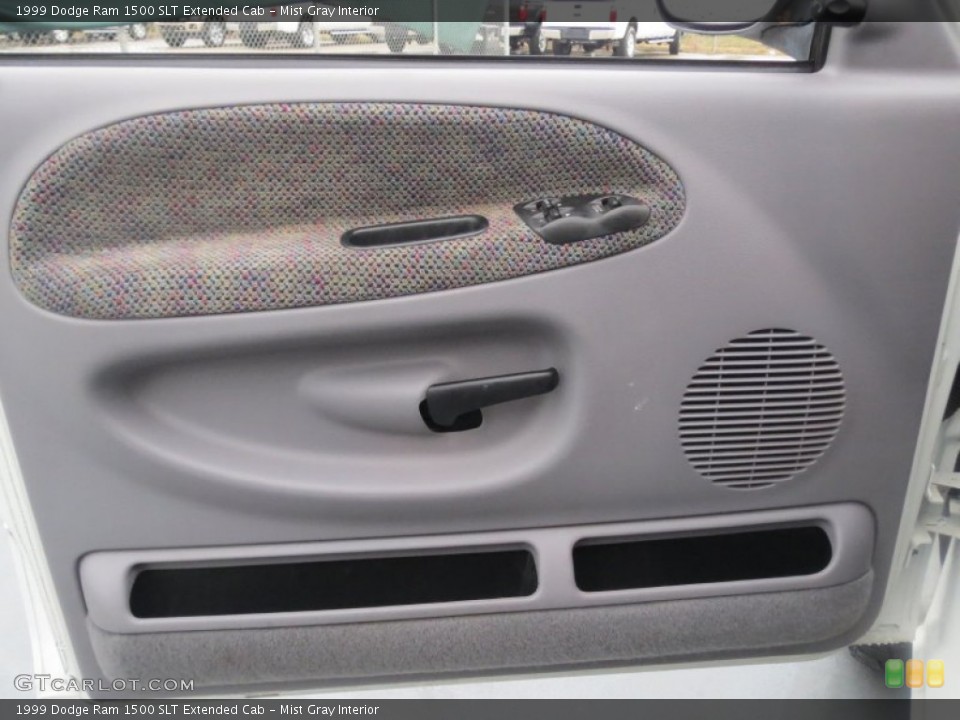 Mist Gray Interior Door Panel for the 1999 Dodge Ram 1500 SLT Extended Cab #75654189
