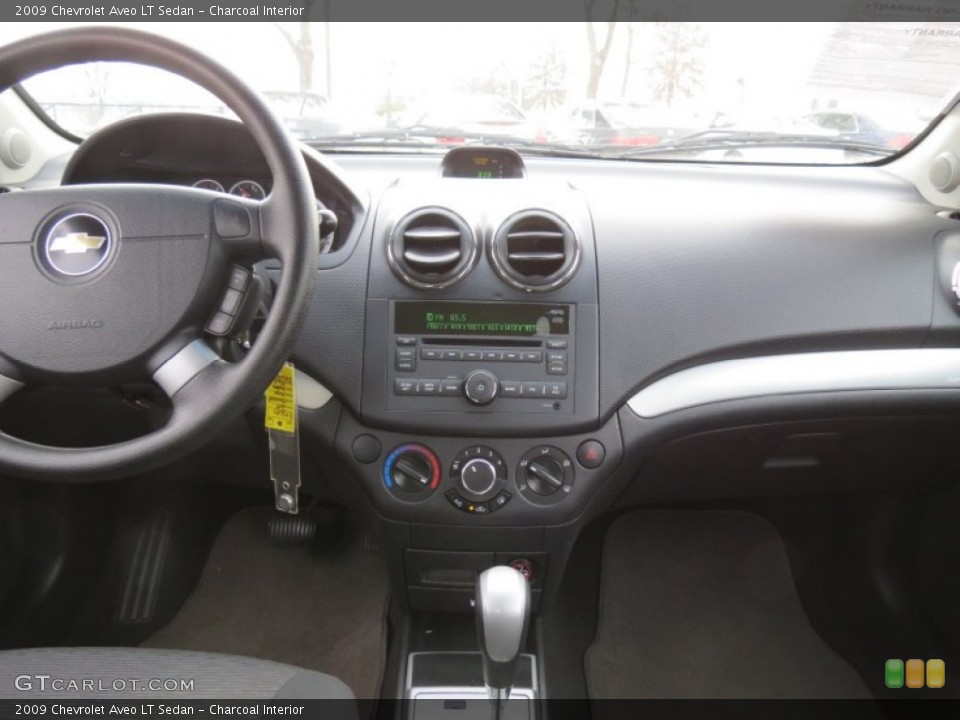 Charcoal Interior Dashboard for the 2009 Chevrolet Aveo LT Sedan #75672509