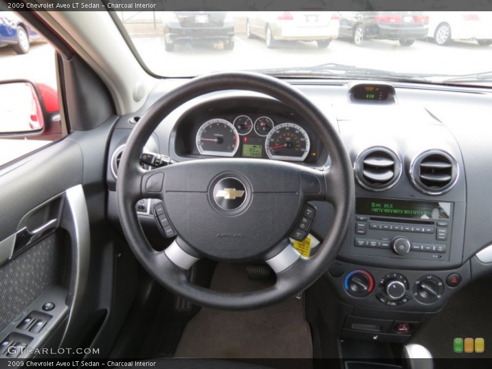 Charcoal Interior Steering Wheel for the 2009 Chevrolet Aveo LT Sedan #75672519