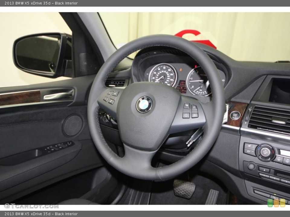 Black Interior Steering Wheel for the 2013 BMW X5 xDrive 35d #75684480