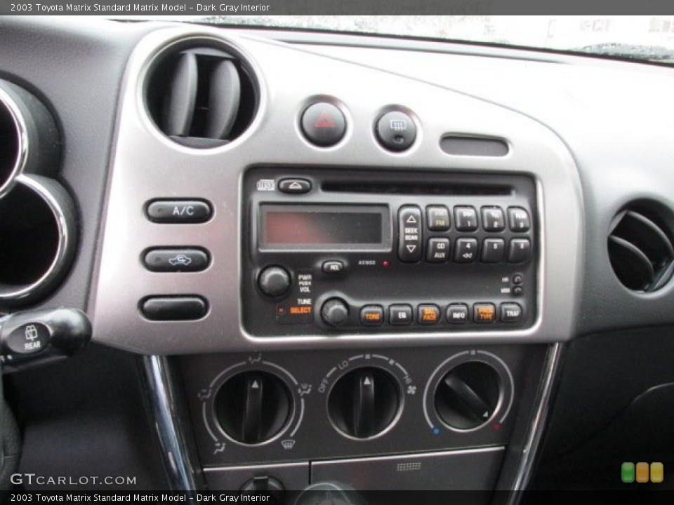 Dark Gray Interior Controls for the 2003 Toyota Matrix  #75693945