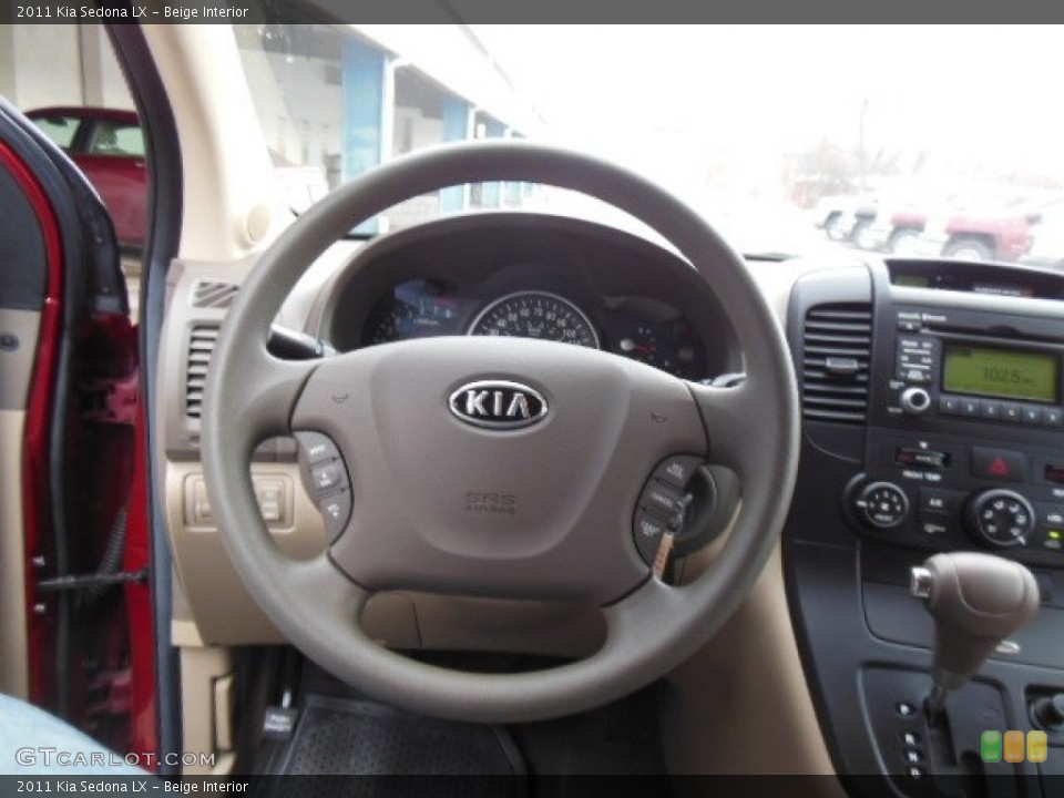 Beige Interior Steering Wheel for the 2011 Kia Sedona LX #75740393