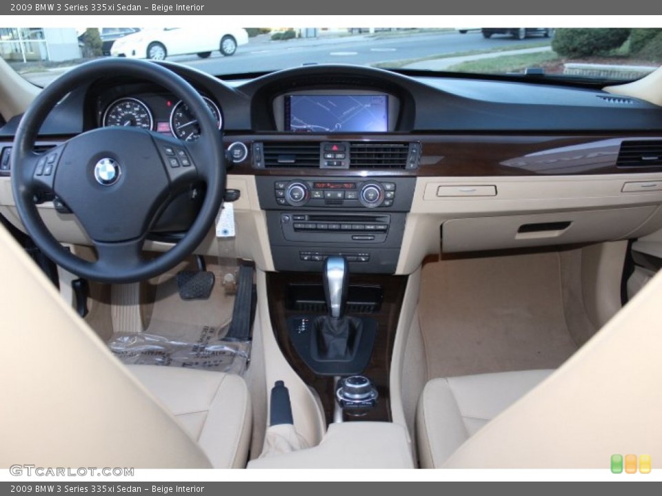 Beige Interior Dashboard for the 2009 BMW 3 Series 335xi Sedan #75740435