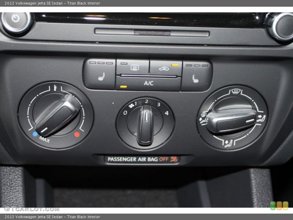 Titan Black Interior Controls for the 2013 Volkswagen Jetta SE Sedan #75754208