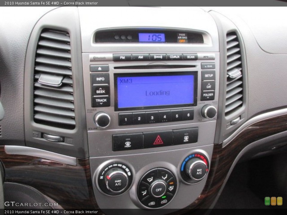 Cocoa Black Interior Controls for the 2010 Hyundai Santa Fe SE 4WD #75755606