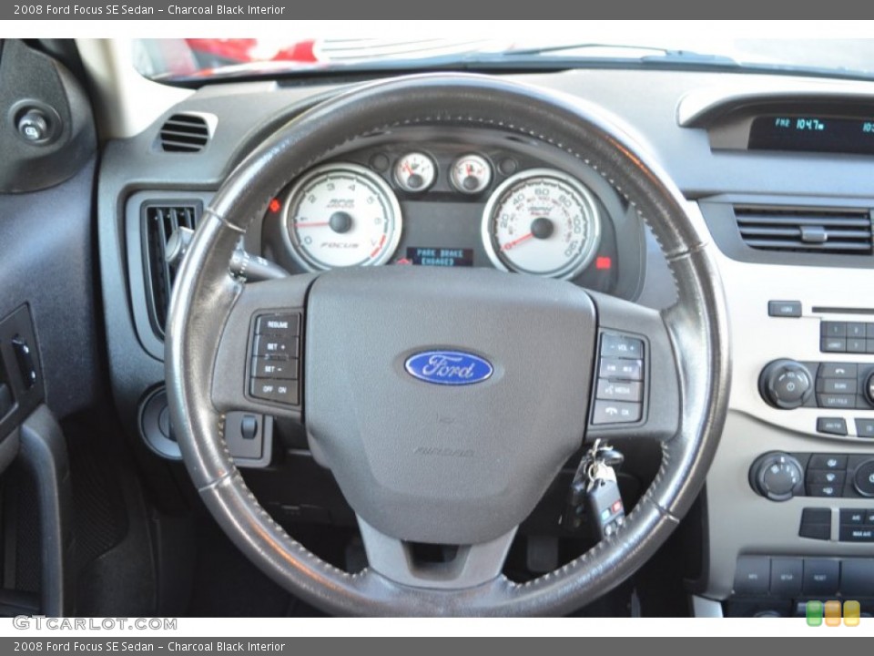 Charcoal Black Interior Steering Wheel for the 2008 Ford Focus SE Sedan #75758529