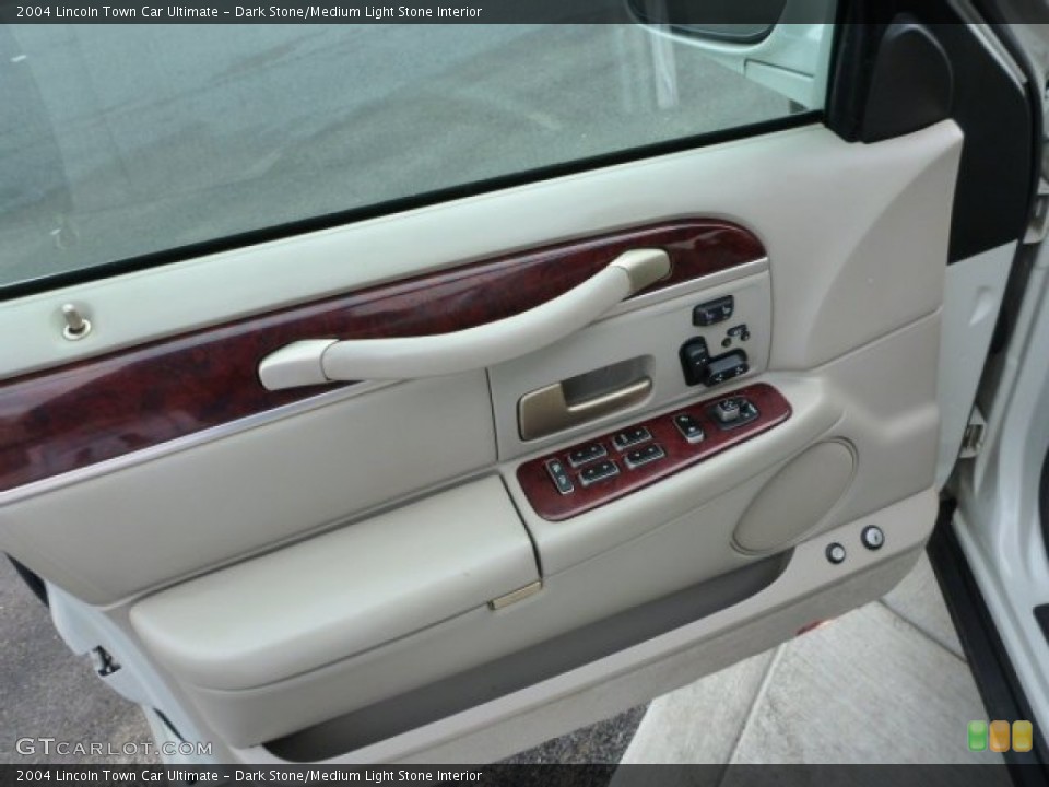 Dark Stone/Medium Light Stone Interior Door Panel for the 2004 Lincoln Town Car Ultimate #75759783