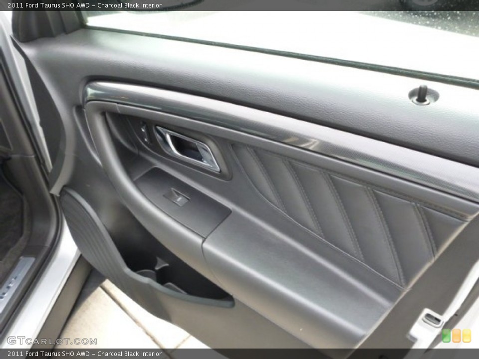 Charcoal Black Interior Door Panel for the 2011 Ford Taurus SHO AWD #75762353