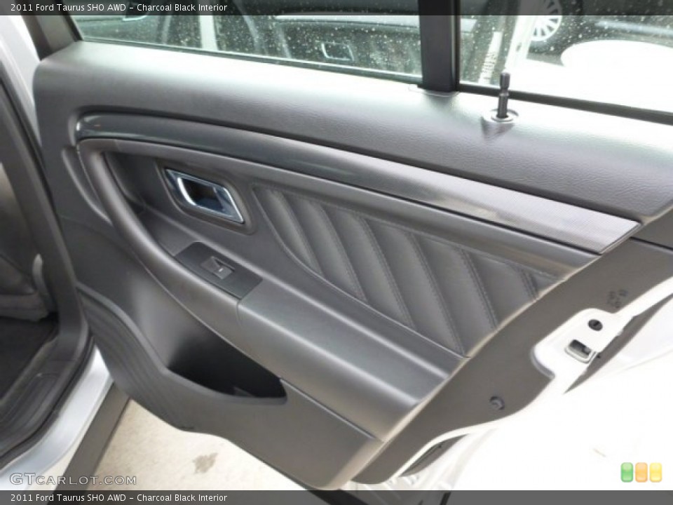 Charcoal Black Interior Door Panel for the 2011 Ford Taurus SHO AWD #75762392