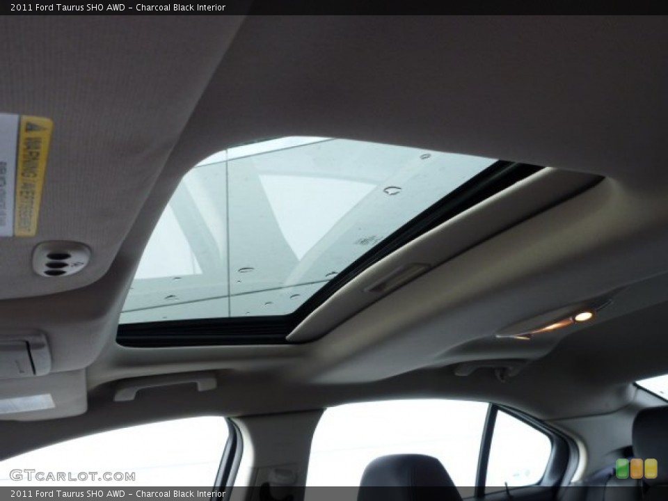 Charcoal Black Interior Sunroof for the 2011 Ford Taurus SHO AWD #75762503