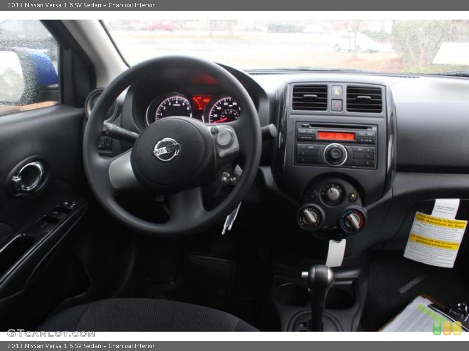 Charcoal Interior Dashboard for the 2013 Nissan Versa 1.6 SV Sedan #75762506