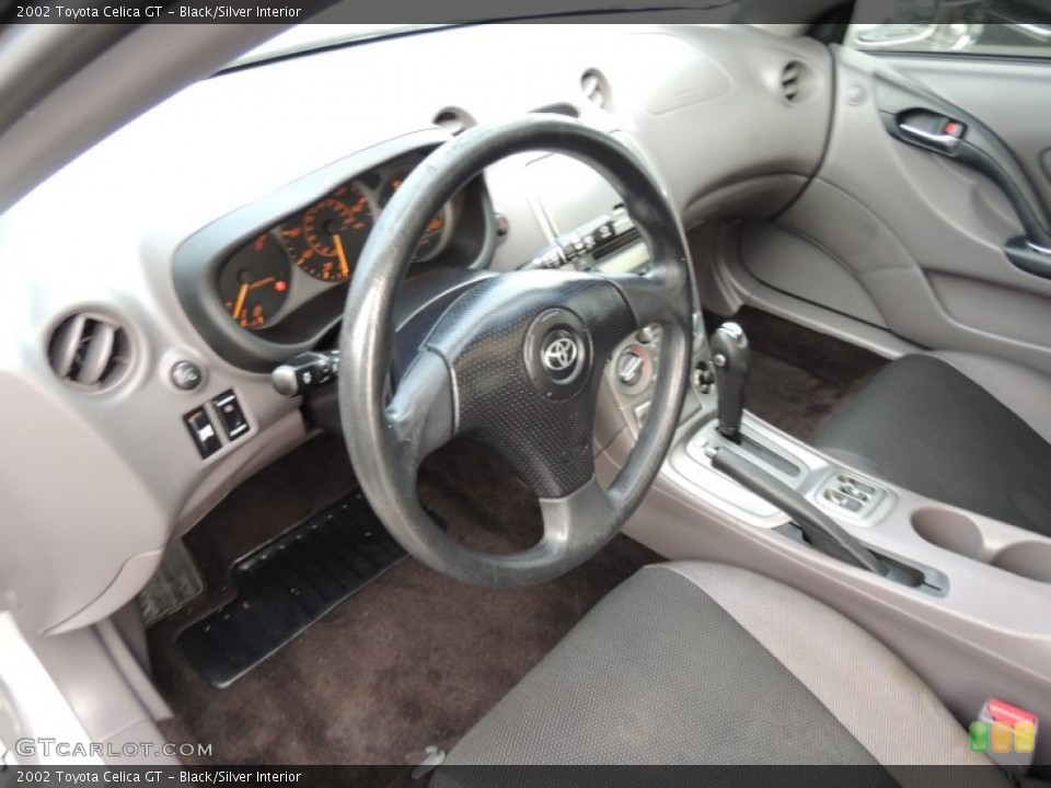 Black/Silver Interior Prime Interior for the 2002 Toyota Celica GT #75765245