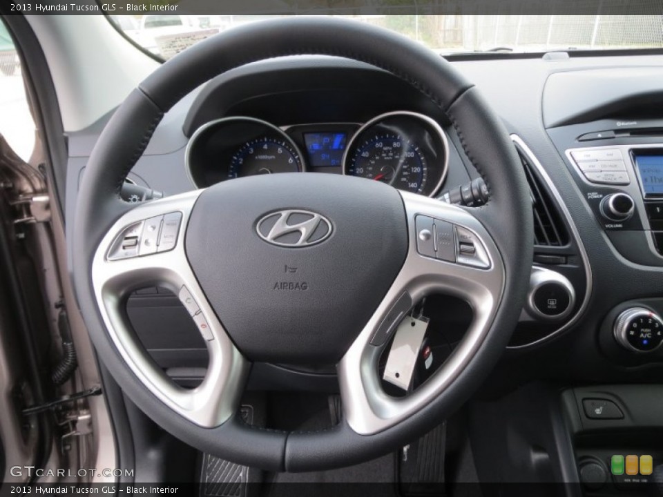 Black Interior Steering Wheel for the 2013 Hyundai Tucson GLS #75777665