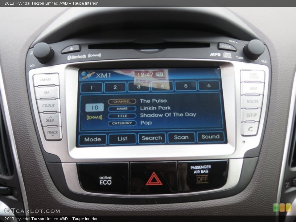 Taupe Interior Controls for the 2013 Hyundai Tucson Limited AWD #75779348