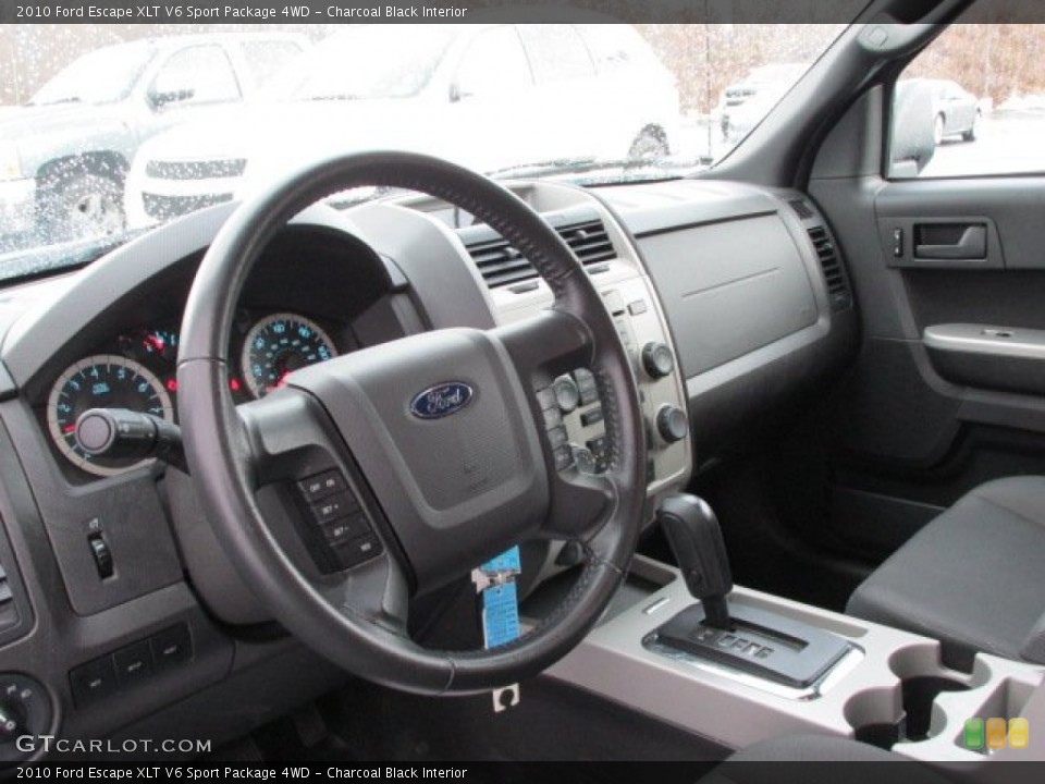 Charcoal Black Interior Dashboard for the 2010 Ford Escape XLT V6 Sport Package 4WD #75802546