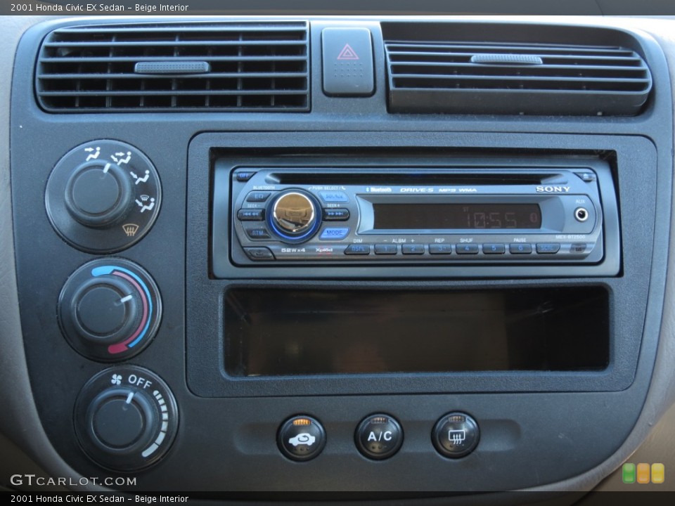Beige Interior Controls for the 2001 Honda Civic EX Sedan #75813409