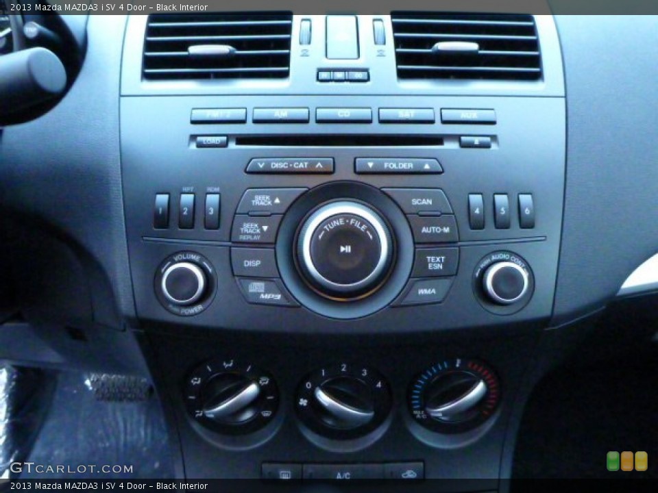 Black Interior Controls for the 2013 Mazda MAZDA3 i SV 4 Door #75819351