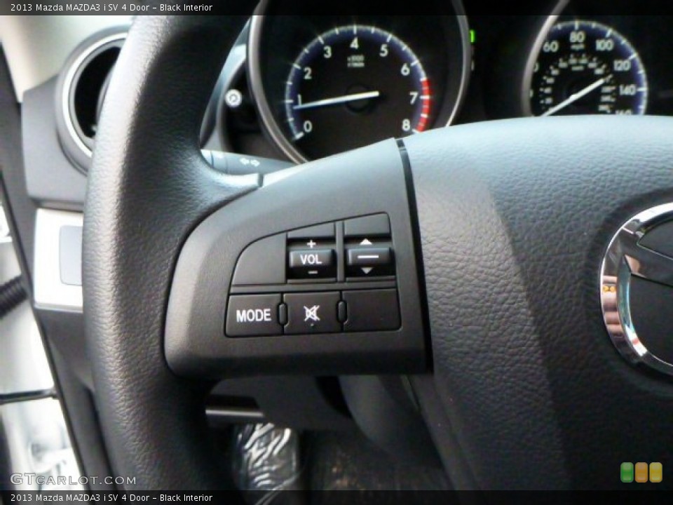 Black Interior Controls for the 2013 Mazda MAZDA3 i SV 4 Door #75819838