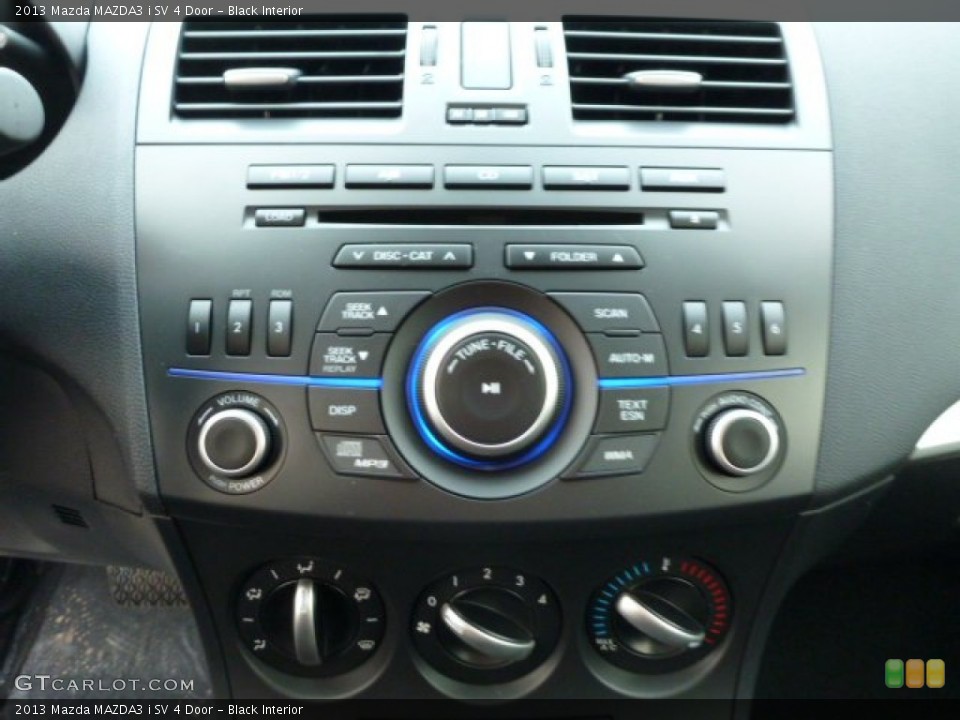 Black Interior Controls for the 2013 Mazda MAZDA3 i SV 4 Door #75819843