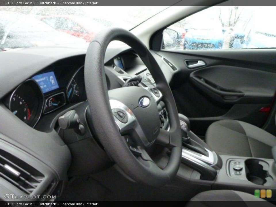 Charcoal Black Interior Steering Wheel for the 2013 Ford Focus SE Hatchback #75824455