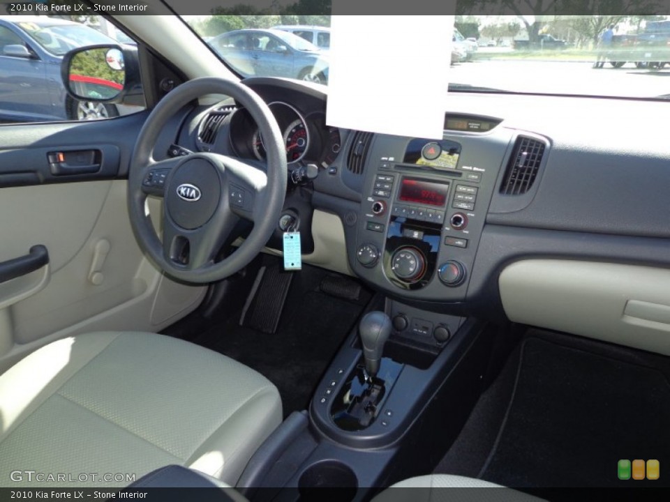 Stone Interior Dashboard for the 2010 Kia Forte LX #75835613