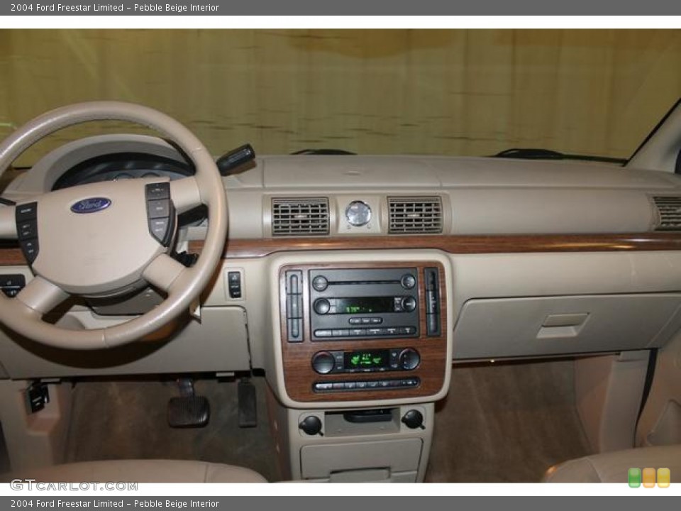 Pebble Beige Interior Dashboard for the 2004 Ford Freestar Limited #75863590