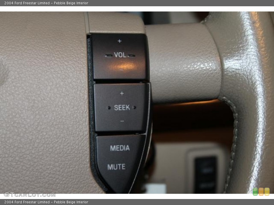 Pebble Beige Interior Controls for the 2004 Ford Freestar Limited #75863752