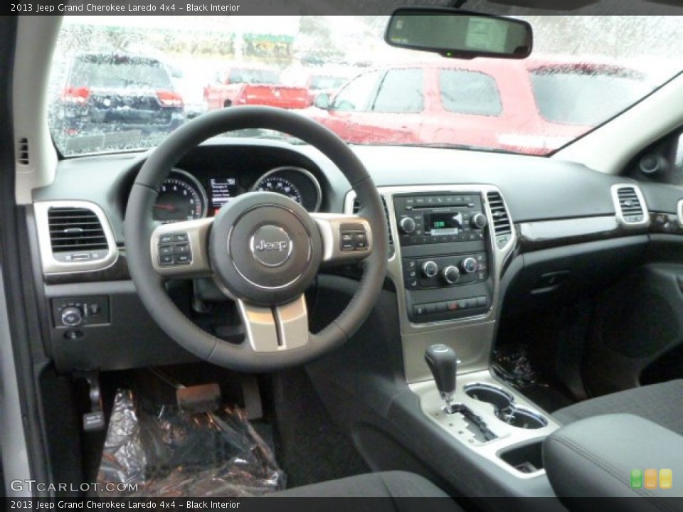 Black Interior Prime Interior for the 2013 Jeep Grand Cherokee Laredo 4x4 #75864493
