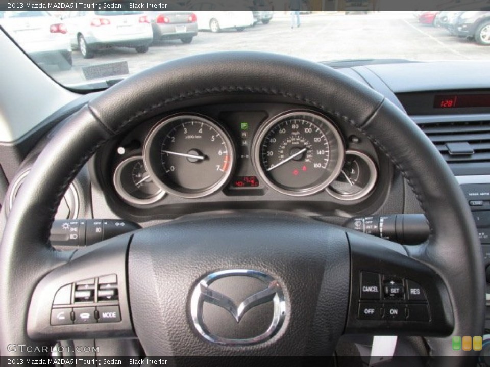 Black Interior Gauges for the 2013 Mazda MAZDA6 i Touring Sedan #75902317