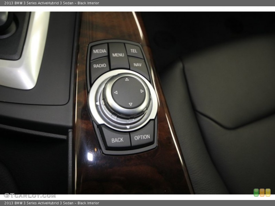 Black Interior Controls for the 2013 BMW 3 Series ActiveHybrid 3 Sedan #75905123