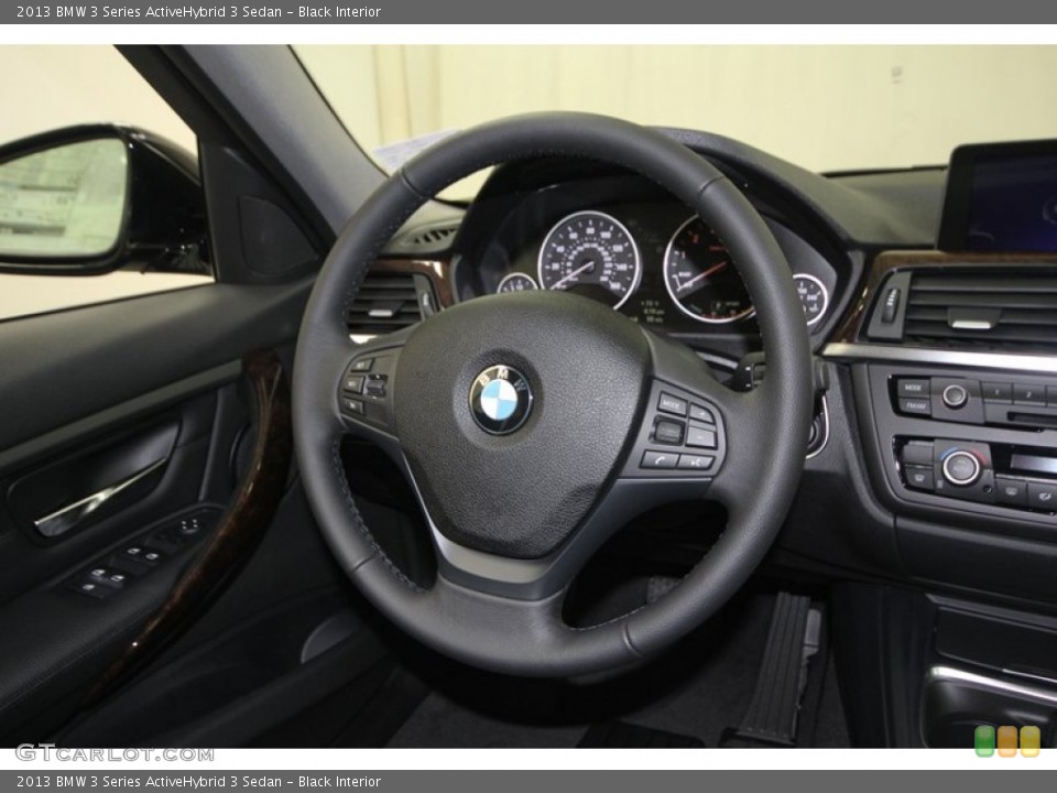 Black Interior Steering Wheel for the 2013 BMW 3 Series ActiveHybrid 3 Sedan #75905239