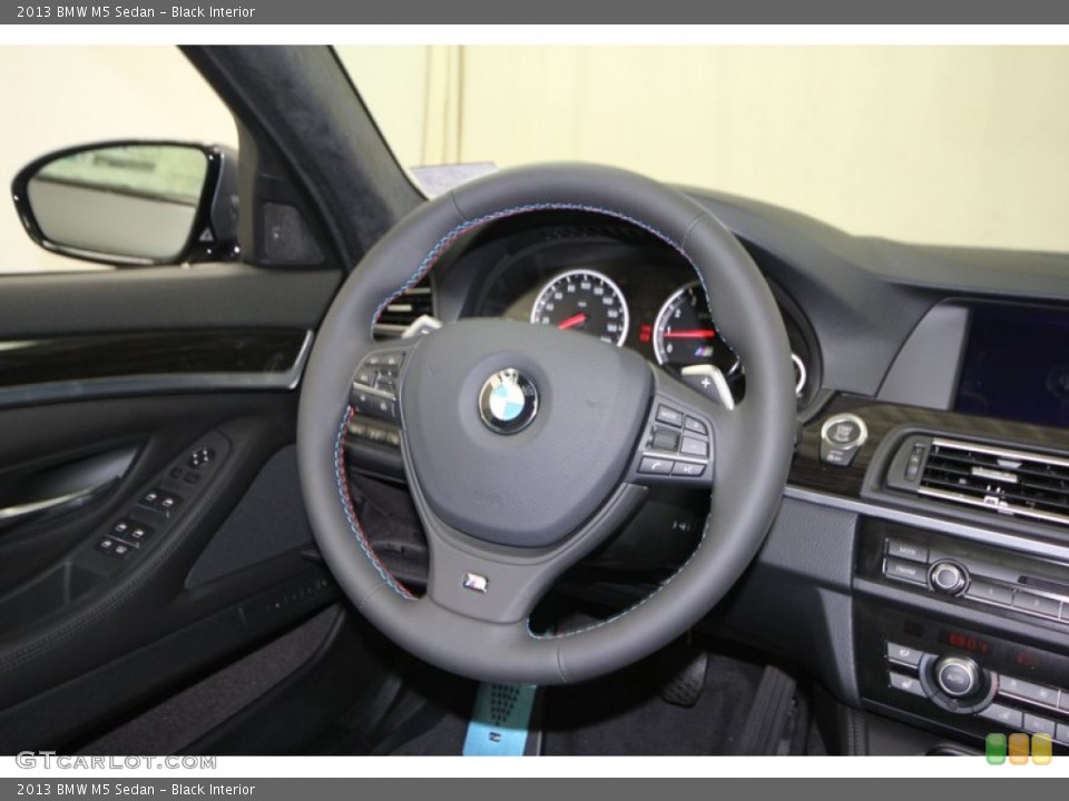 Black Interior Steering Wheel for the 2013 BMW M5 Sedan #75908458